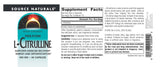 Capsules L-Citrulline près d'un verre d'eau, idéal pour la supplémentation.