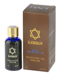 Spring Nahal huile sainte: bouteille en verre claire, parfums sacrés pour cérémonies religieuses.