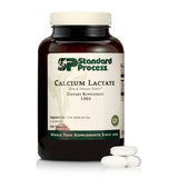 Standard Process Calcium Lactate tablettes en boîte pour le soutien osseux et musculaire.
