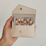 STERCULIA design pratique beige s’intègre facilement dans un sac.