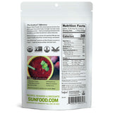 Verre de jus rouge avec Sunfood Betterave pour couleur naturelle.