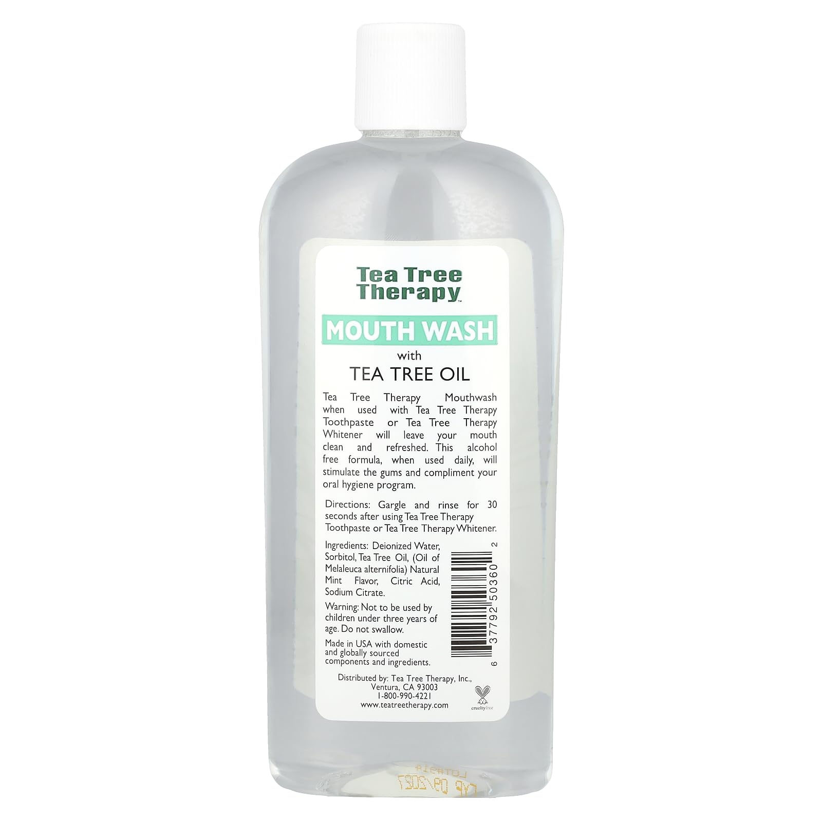Tea Tree Therapy bain de bouche sans alcool, etiquette claire et design moderne pour la salle de bains.