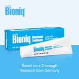 Texture crèmeuse du dentifrice Bioniq prête à l’application lors du brossage.