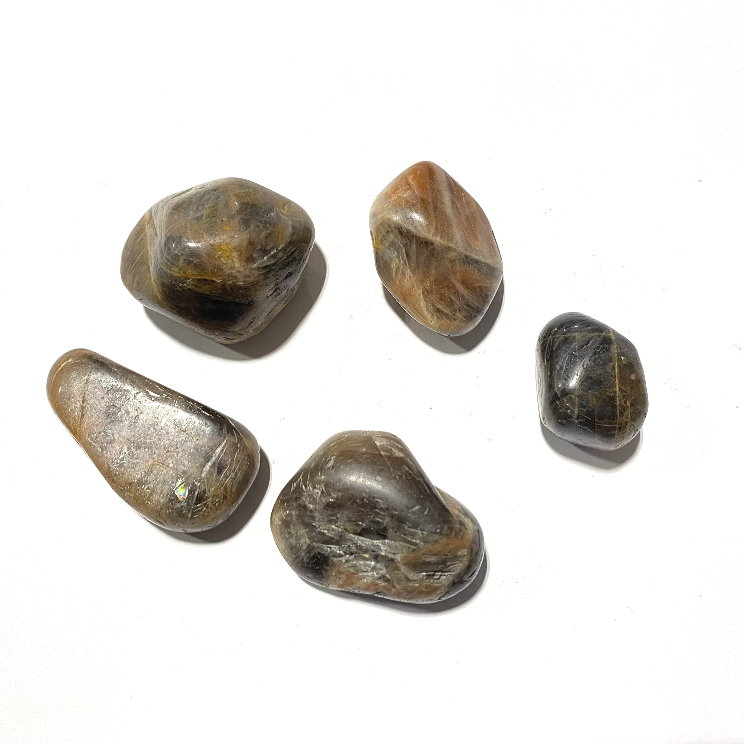 The Chrysalis Stone — pierre noire fertilite feminine pour équilibre émotionnel.