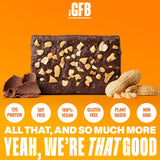 The GFB barres-protéine chocolat cacahuète près d'un verre d'eau après l'entraînement.