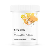 Thorne Probiotique Quotidien Femmes - Bouteille et capsules, soutien potentiel à l'équilibre intestinal.