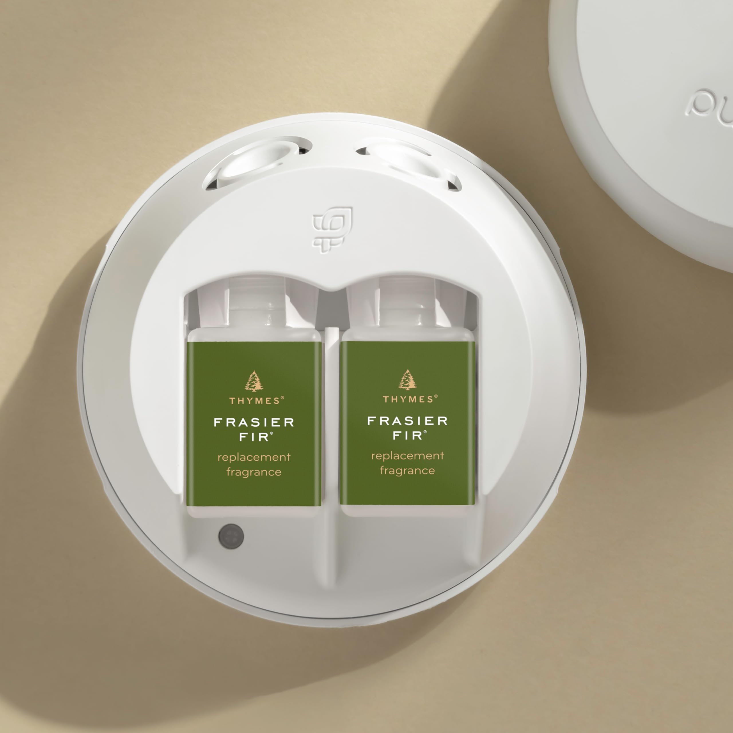 Flacon-recharge Frasier Fir de Thymes, libérant une senteur sapinée et naturelle.
