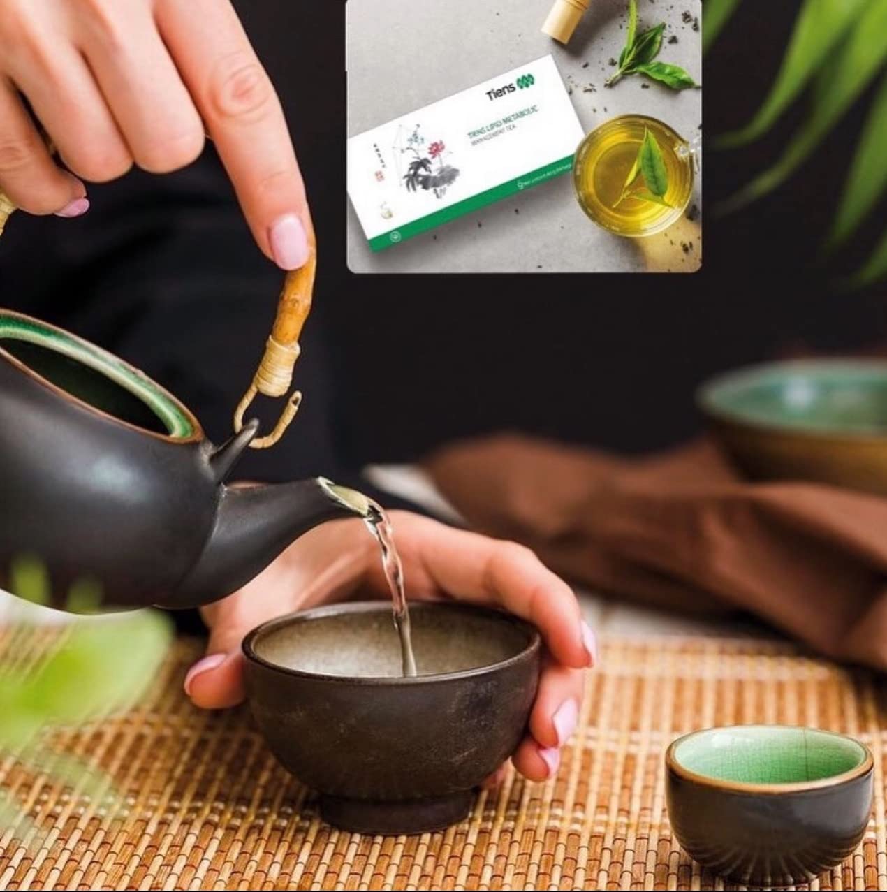 TIENS Lipid Metabolic Tea, feuilles de gynostemma visibles dans l’infusion.