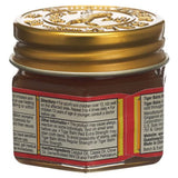 Tiger Balm rouge, application avant l’entraînement pour préparer les muscles.