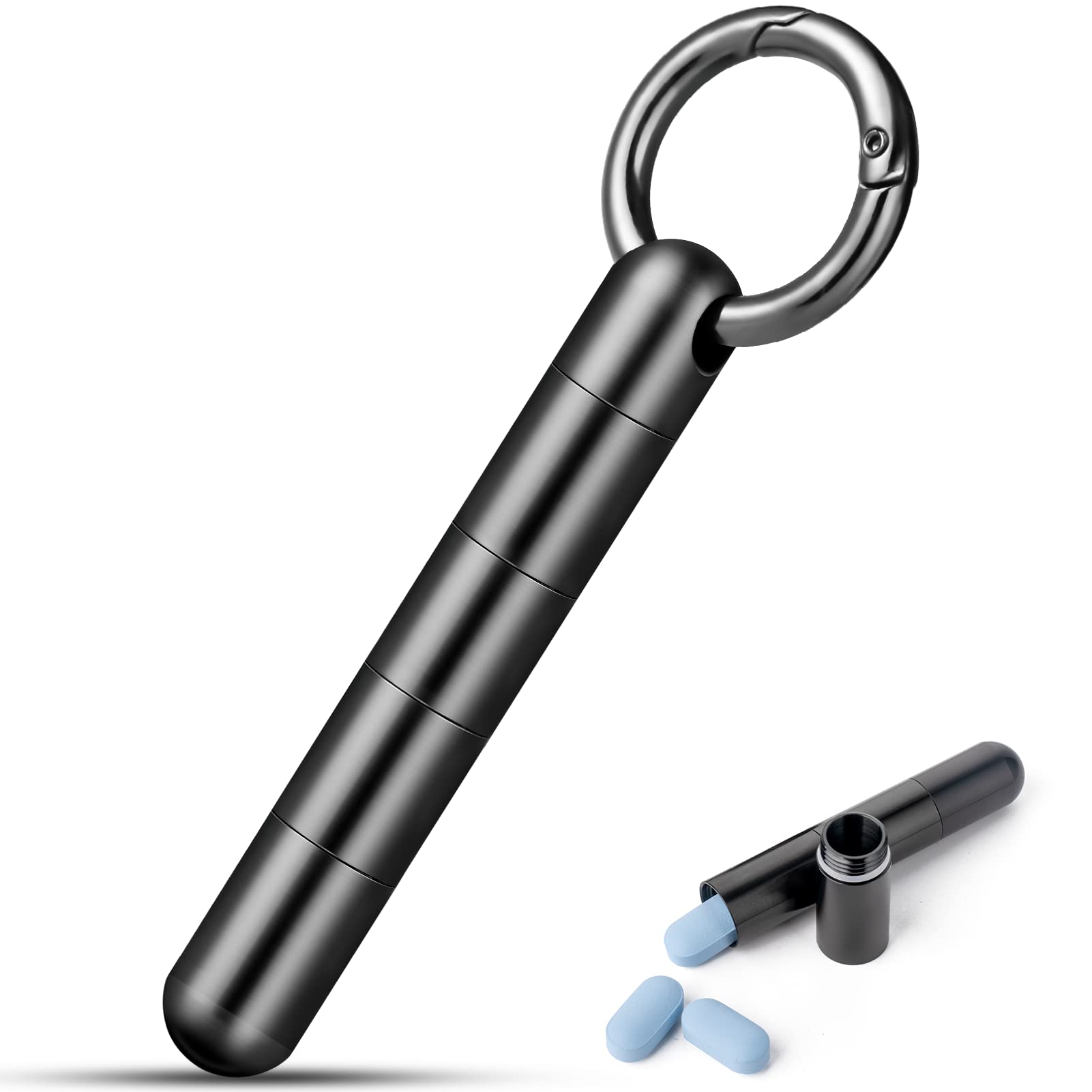 Porte-pilules TISUR accrochée à un porte-clés, pratique et accessible.