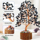 Tizzomx Arbre obsidienne branche énergie positive et focus en espace de travail.