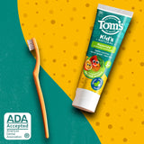 Tom's of Maine dentifrice enfant Orange Mango, emballage visible sur étagère.