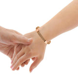 Touchstone bracelet forge-main cuivre-laiton, artisanat robuste et authentique.