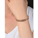 Touchstone bracelet tibetain magnetique deux tons, aimants proches peau pour le contact direct.
