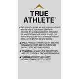 Capsules True Athlete ZMA + L Theanine dans un verre d’eau pour démontrer l’usage.