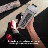 Boîte ou poche: TRULABS Hydrate Orange Twist pratique en déplacement.