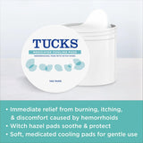 Compresse humide TUCKS pour apaiser les tissus irrités.