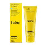 TWICE dentifrice anti-caries fluorure dans un emballage élégant, protection quotidienne.
