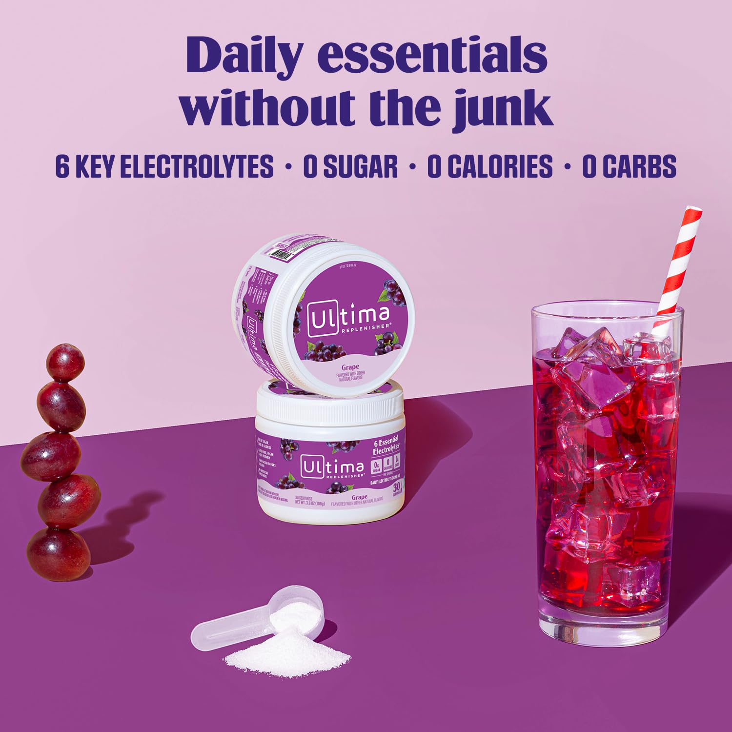 Verre d'eau avec Ultima Replenisher au goût raisin, boisson rafraîchissante.