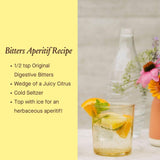 Urban Moonshine Original Digestive Bitters — bouteille dans un verre après repas.