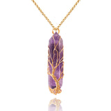 Pendentif VIBILIA en améthyste pointe arbre de vie, mise en valeur pour concentration et esthétique.