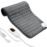 Coussin chauffant VIBOOS sur le dos et la nuque pour soulager les tensions.