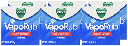 Massage ciblé avec Vicks VapoRub sur les muscles et articulations.