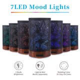 Diffuseur au design bois et métal de Victoria Aroma en usage domestique.