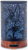 VICTORIA AROMA diffuseur métal avec motif hummingbird sur socle élégant.