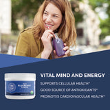Cuillère-dose Vimergy près d'un smoothie, facile à doser.
