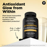 Vital Vitamins Astaxanthin gélules — bouteille ouverte montrant le complément, soutien quotidien de la peau