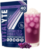 Vitalyte Électrolyte poudre, versement dans verre, hydratation rapide pendant l'entraînement