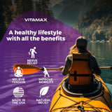 Vitamax: main tenant le flacon en maison pour usage domestique