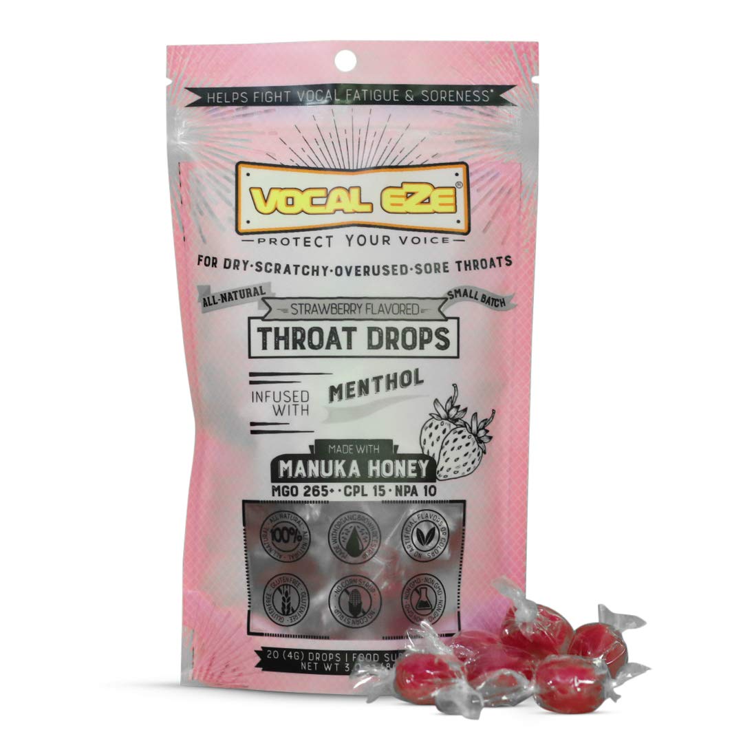 Pastilles Vocal Eze Manuka Fraise Menthe dans l'emballage, pratique pour la voix.
