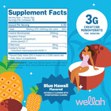 Préparation Wellah Creatine Blue Hawaii dans un verre, goût tropical rafraîchissant