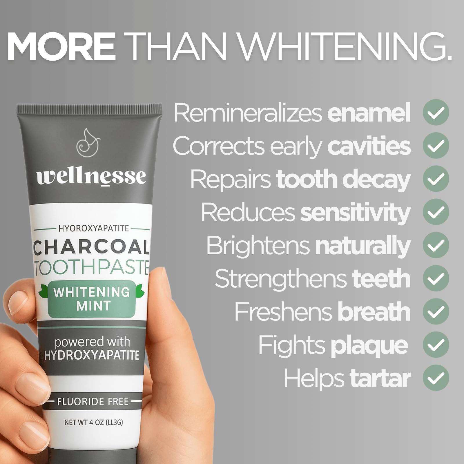Pâte noir charbon Wellnesse sur une brosse à dents