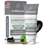 Wellnesse dentifrice charbon actif - emballage présentant le soin naturel