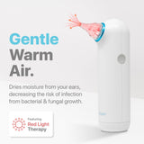 Whisper Ear Dryer avec lumière rouge activée, expérience de soin légère.