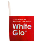 Micro-particules de blanchiment visibles dans le dentifrice White Glo.