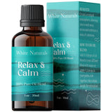 White Naturals Relax & Calm, bouteille ambrée—aromathérapie apaisante à portée de doigts.