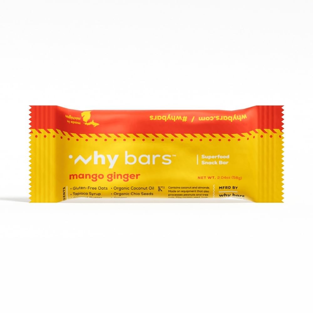 Why Bars Mango Ginger en main, collation rapide en déplacement.