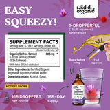 Étiquette Wild & Organic sur bouteille indiquant ingrédients vegan et absence d’alcool.
