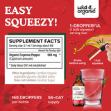 Pipette et flacon Wild & Organic Cayenne sur fond clair.