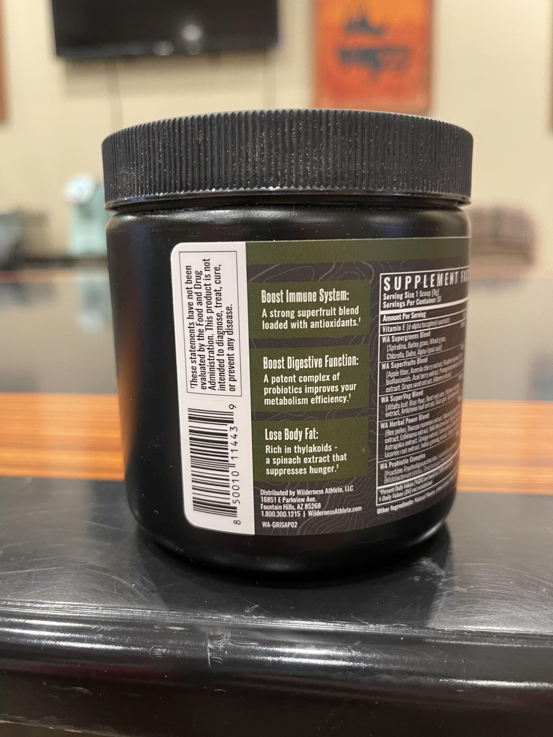 Wilderness Athlete Infusion Verte poudre fine: texture lisse et goût fruité.
