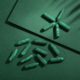 Points hexagonaux malachite YATOJUZI pour canaliser énergie et clarté.