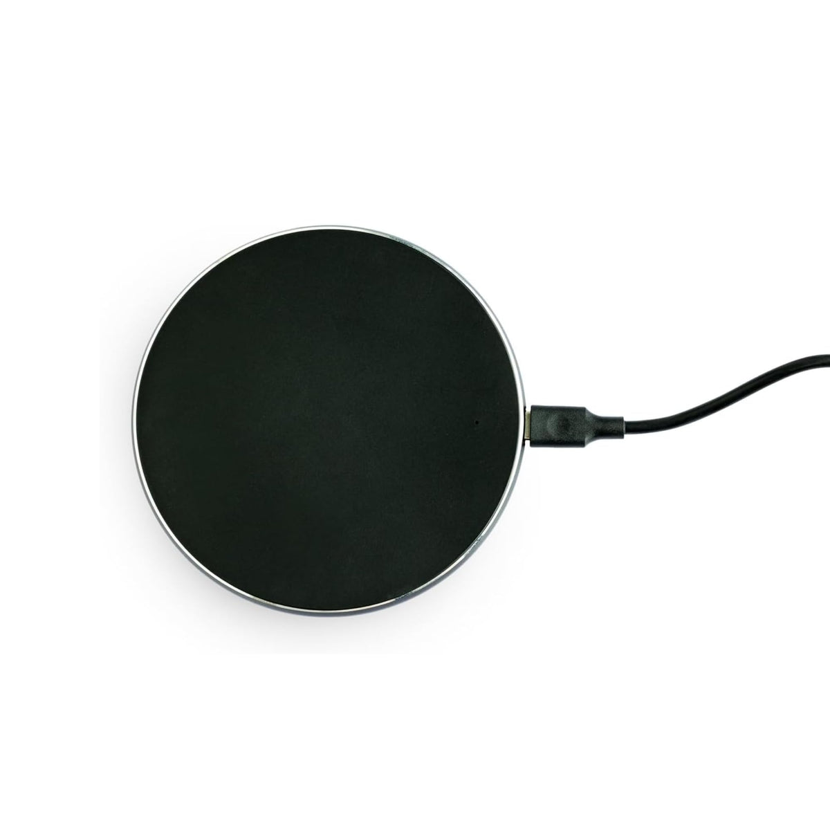 Chargeur sans fil Yogasleep avec Hushh+ sur plateau élégant et compact, recharge efficace.