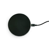 Chargeur sans fil Yogasleep avec Hushh+ sur plateau élégant et compact, recharge efficace.