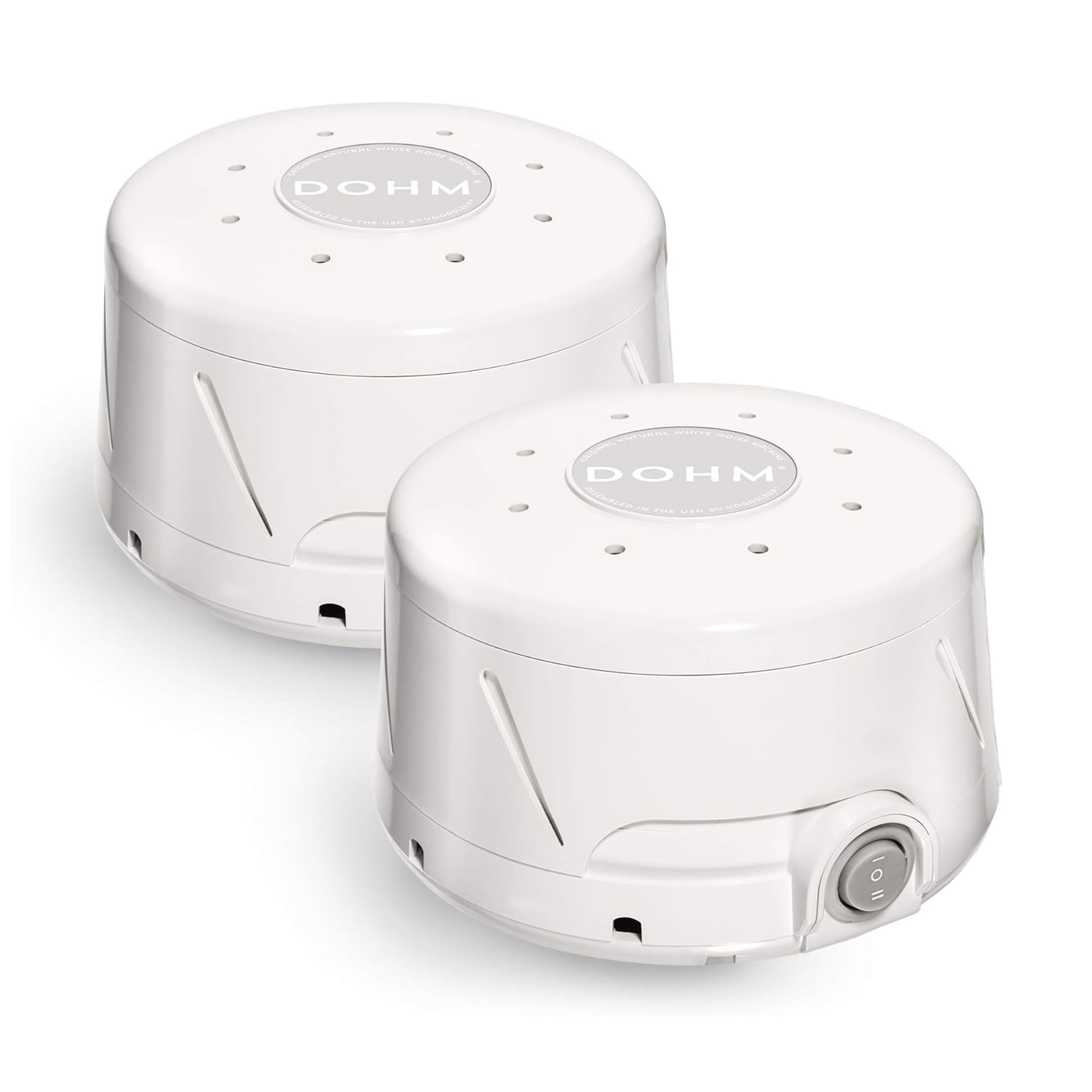 Yogasleep Dohm Classic: deux appareils blancs sur table de nuit pour favoriser le sommeil.