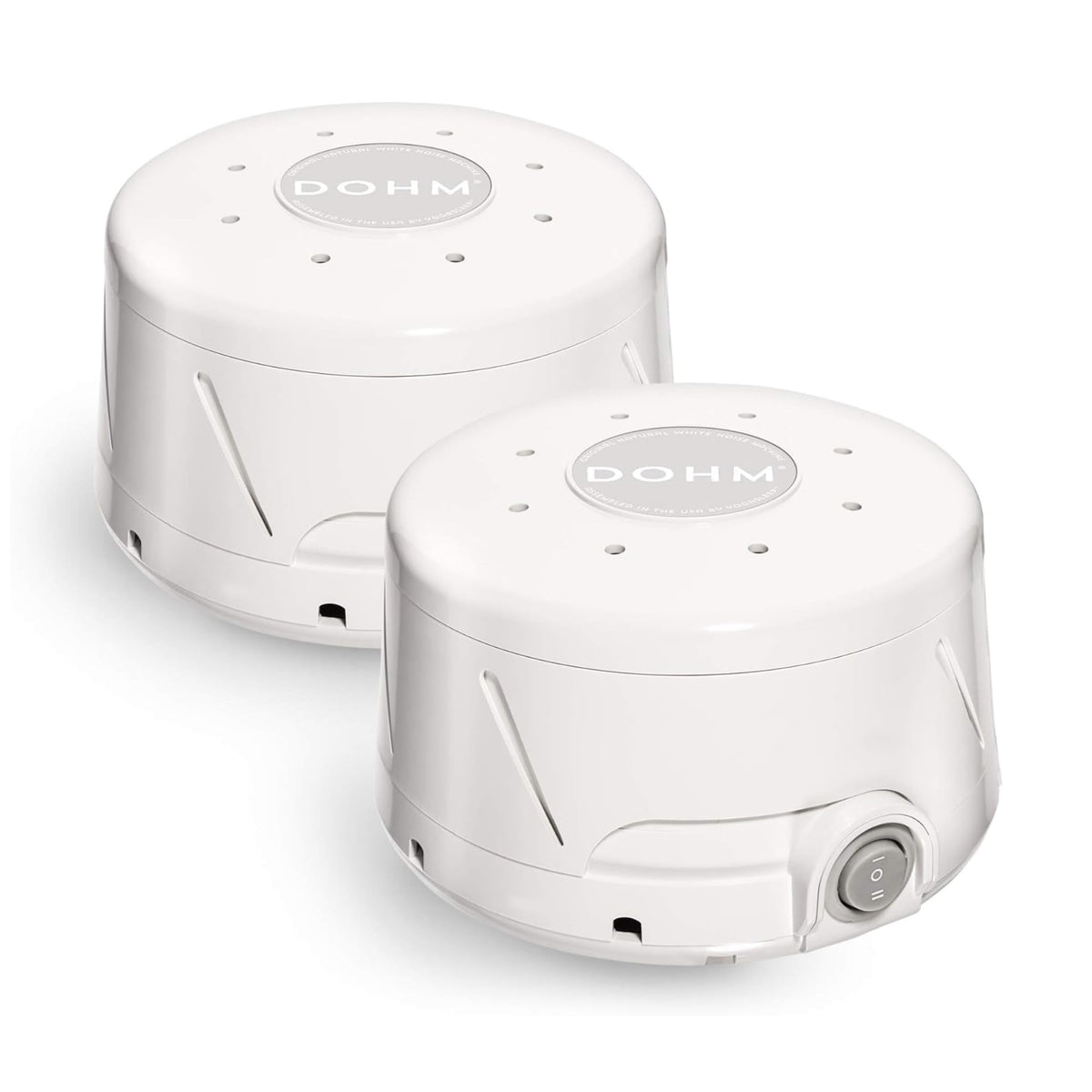 Yogasleep Dohm Classic: deux appareils blancs sur table de nuit pour favoriser le sommeil.
