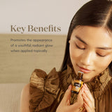 Application topique de Copaiba Young Living sur la peau délicatement diluée.